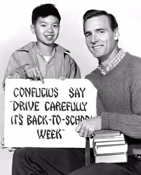 Photo of Rickey Der as Ike, Jones' adopted son, and Dennis Weaver as "Kentucky" Jones from the television program Kentucky Jones. (1964)