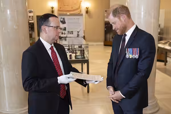 Army National Miliary Cemeteries Historian Tim Frank shows Prince Harry the citation that accompanied the Victoria Cross presented to the U.S. WWI Unknown Soldi (2026)