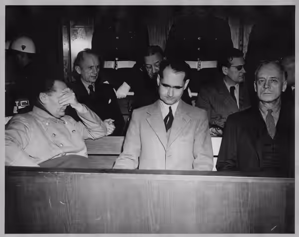 Defendants at the Nuremberg War Crimes Trials. From left to right, Hermann Goering, Admiral Karl Doenitz, Admiral Erick Raeder, Rudolf Hess, Baldur von Schirach (1946)