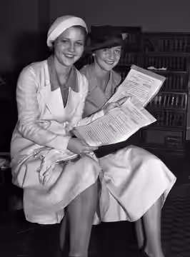 Betty Furness (left) and Phyllis Fraser, both age 16, with newly approved contracts, Los Angeles (1932)
