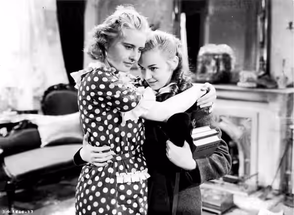 Barbara Stanwyck and Anne Shirley in Stella Dallas (1937) publicity still.