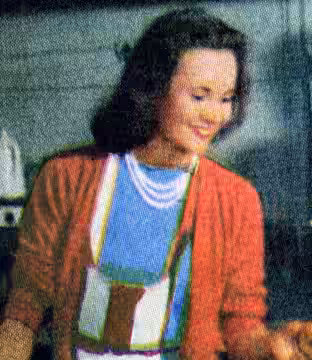 Photograph of Elizabeth Inglis (left) working at the Stage Door Canteen in New York City Photograph appears within the feature "Life Goes to the Stage Door Cant (1944)