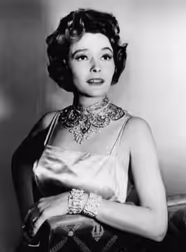 Photo of Patricia Neal guest-starring as a nightclub owner in an episode of The Untouchables. (1962)