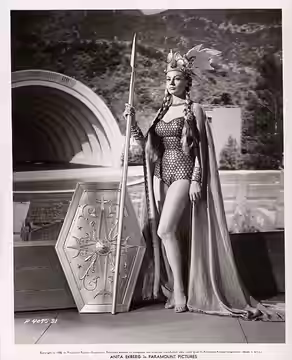 Anita Ekberg poses as the Valkyrie guardian of the sacred jug of mead, as she appeared in the opening credits of the 1956 Paramount Pictures film, Hollywood or 