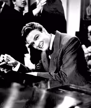 John Ericson in Rhapsody (1953)