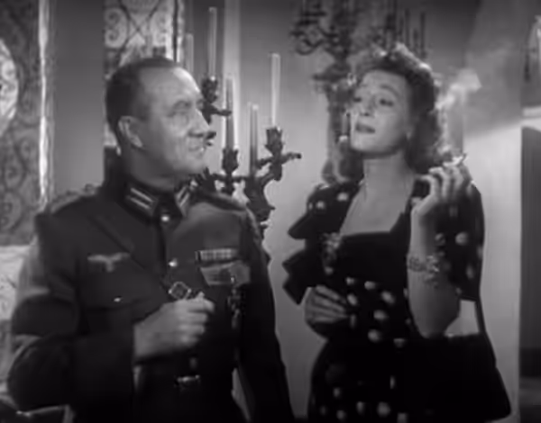 Tala Birell and Gordon Richards in the public domain film Women in the Night - cropped screenshot (1948)