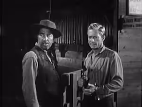 Richard Reeves and Richard Denning in the film The Buckskin Lady (1957) - cropped screenshot