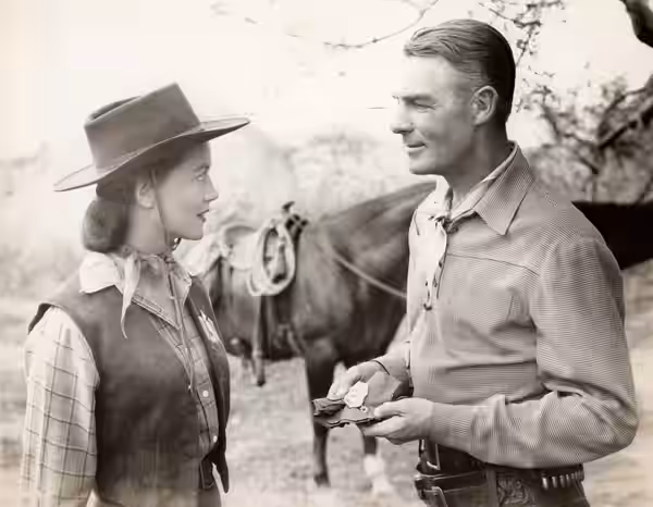 Dorothy Malone and Randolph Scott star in The Nevadan. (1950)
