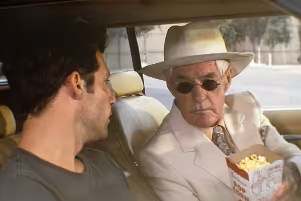 Max Parrish as Eli Bud Fritz and Timothy Leary as Mr. Jones in Hold Me, Thrill Me, Kiss Me, 1992 (2013)