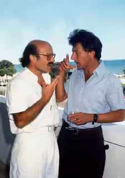 L'attore americano Dustin Hoffman con il regista Volker Schlondorff alla Mostra del cinema di Venezia del 1984