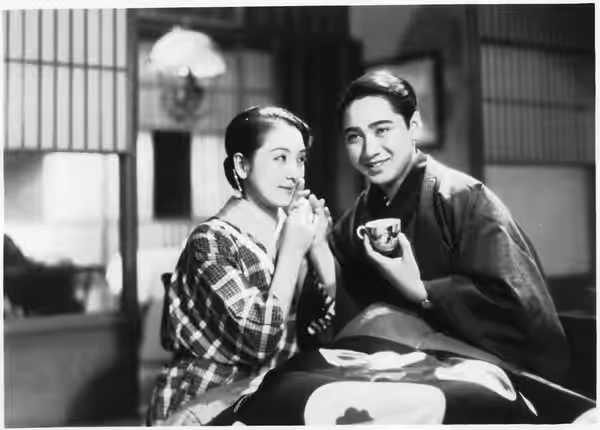 Hiroko Kawasaki and Kazuo Hasegawa in Hanamuko no negoto (花婿の寝言) directed by Heinosuke Gosho, 1935