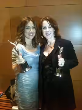 Sasha and Janet celebrate wins (2011)