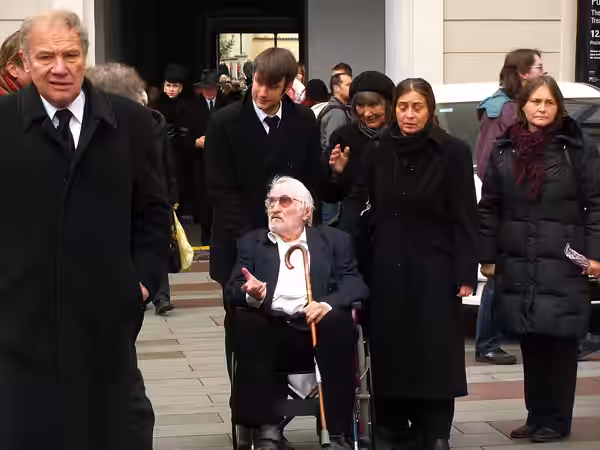 Martin Palouš (left), Pavel Landovský (on the wheelchair) and his son Jakub Landovský (behind the wheelchair) and Dana Němcová (with cap) at Prague Castle befor (2011)