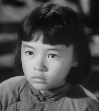 American actress Nancy Hsueh as child in the American film Intrigue - cropped screenshot (1947)