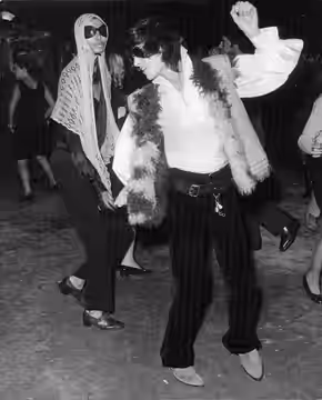 Donyale Luna dancing and enjoying with a man in a party, 1967.