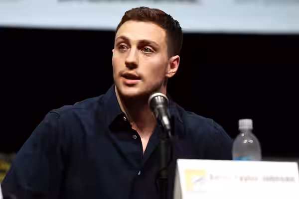 Aaron Taylor-Johnson speaking at the 2013 San Diego Comic Con International, for "Kick-Ass 2", at the San Diego Convention Center in San Diego, California. Plea