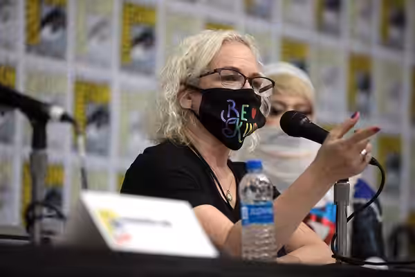 Elizabeth Dennehy speaking at the 2021 San Diego Comic Con Special Edition, for "Lights, Camera ... Identity! Never Alone", at the San Diego Convention Center i