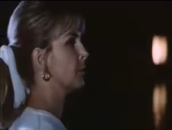 Cropped screenshot of Joanne Woodward from the trailer for the film Winning (1969)