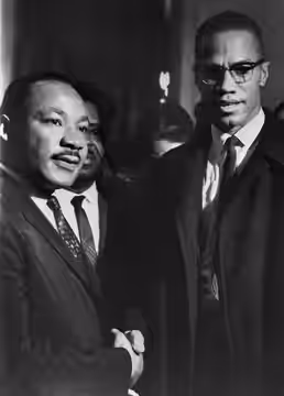 GUNS DOWN MALCOM X: NEW YORK: Black Nationalist leader Malcolm X was shot and killed February 21st while addressing a rally of 500 at the Audubon Ballroom. Malc (1964)