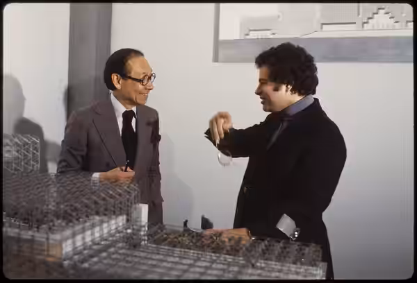 Itzhak Perlman with I.M. Pei, architect, looking at model of NYC Convention Center (1980)