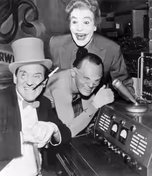 Publicity photo of some of the villians from Batman. From left: The Penguin Burgess Meredith, The Riddler Frank Gorshin, and The Joker Cesar Romero