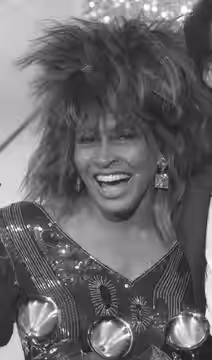 Tina Turner posing at the 27th Grammy Awards in Los Angeles, California (1985)