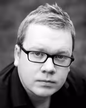 A headshot of British actor/writer/director Jim Field Smith by photographer Matthew Field (2007)
