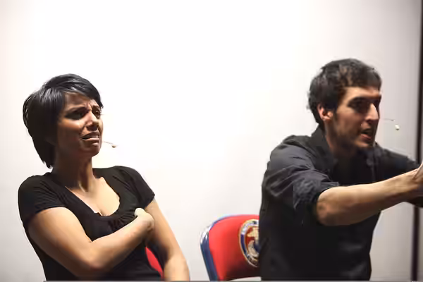Actors Fawzia Mirza, left, and Christian Breier act out a dating scene at Marine Forces Reserve Headquarters in New Orleans, La., April 1, 2011. The improvisati