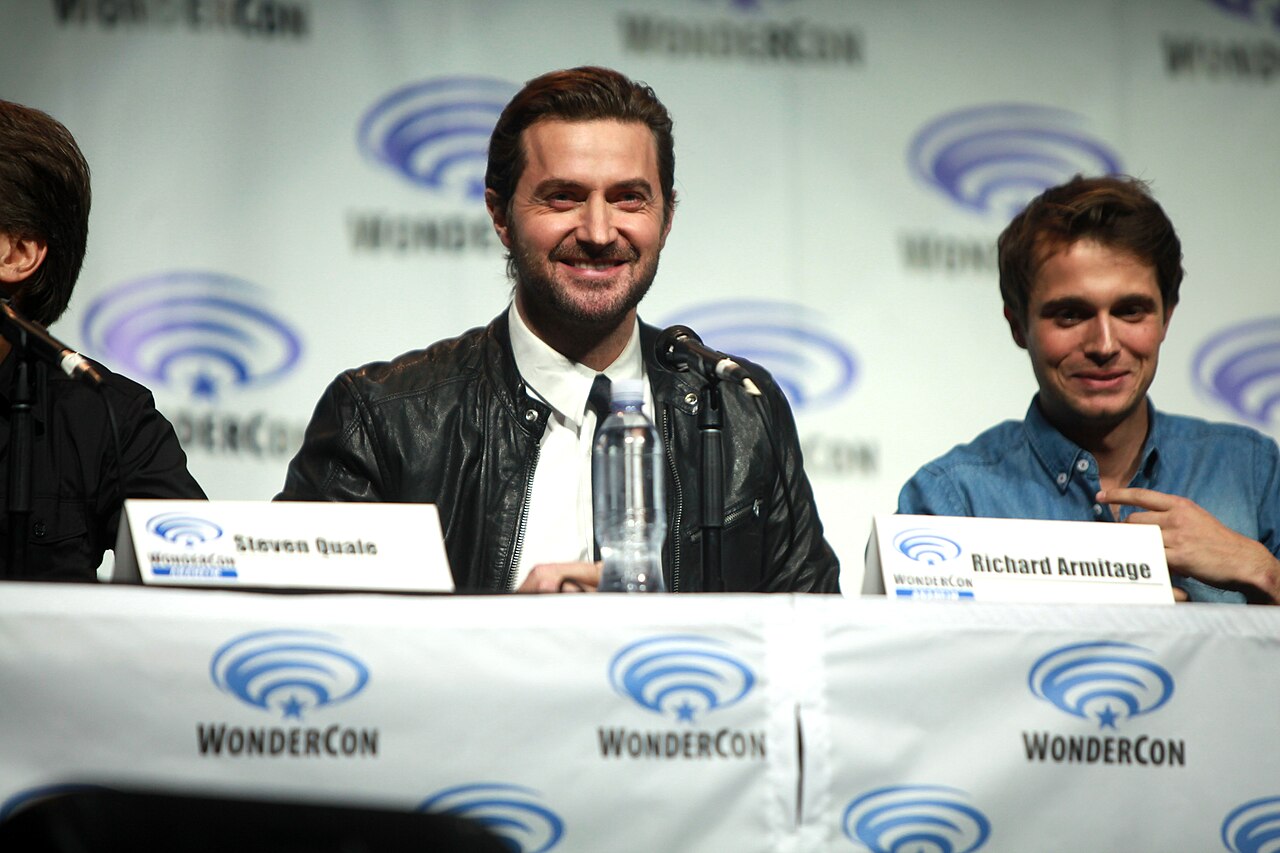 Richard Armitage and Max Deacon speaking at the 2014 WonderCon, for "Into the Storm", at the Anaheim Convention Center in Anaheim, California. Please attribute 