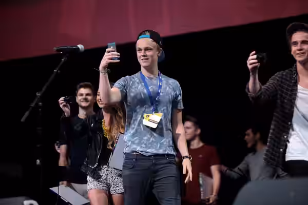 Caspar Lee, Joe Sugg, Zoe Sugg, Zoella, Jim Chapman, Marcus Butler and Alfie Deyes speaking at the 2014 VidCon at the Anaheim Convention Center in Anaheim, Cali