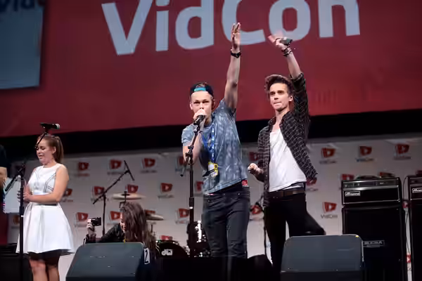 Caspar Lee, Joe Sugg, Zoe Sugg, Zoella, and Tanya Burr speaking at the 2014 VidCon at the Anaheim Convention Center in Anaheim, California. Please attribute to 