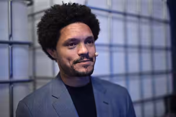 26 February 2024; Trevor Noah, Author &amp; Presenter on Centre Stage during the opening night of Web Summit Qatar 2024 at the Doha Exhibition and Convention Ce