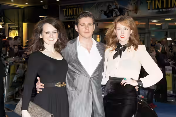 British actresses Sophie McShera (left) and Zoe Boyle (right) with Irish actor Allen Leech at the UK film premiere of The Adventures of Tintin: The Secret of th (2011)