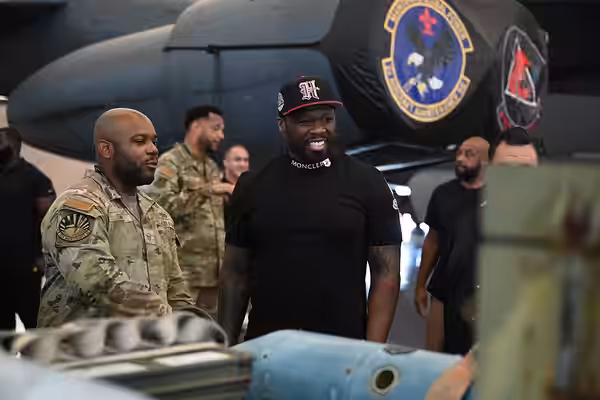 MSgt Dion Smith, loading standardization crew chief from the 2nd Maintenance Group, briefs Curtis "50 Cent" Jackson on the weapons employed by the B-52H Stratof (2024)