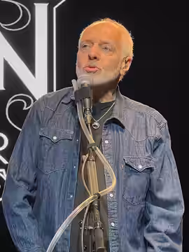 Frampton performing, 2024