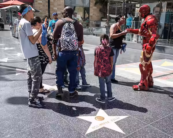 Iron Man stands near Peter Frampton's star on the Hollywood Walk of Fame (2014)