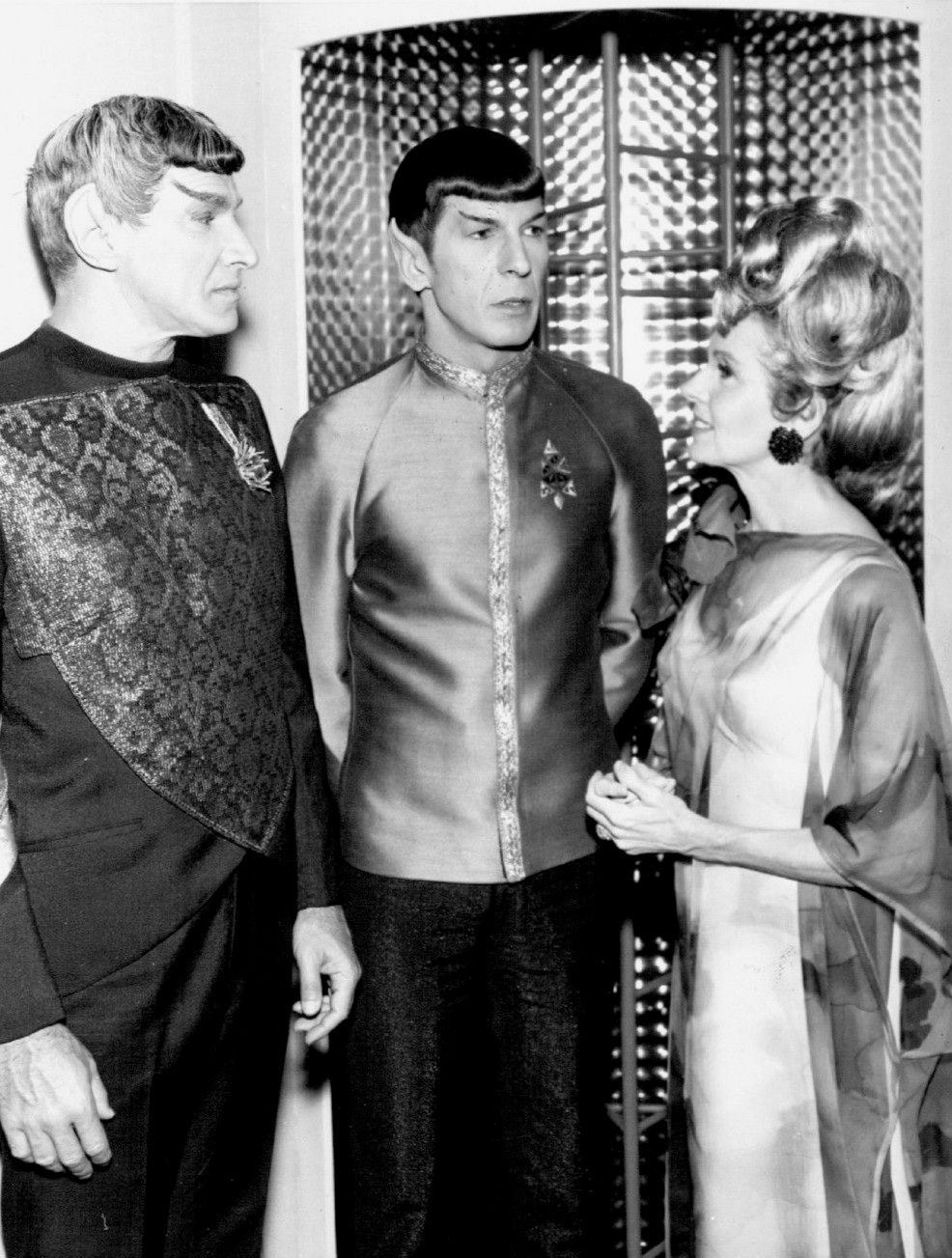 Photo of Mr. Spock with his parents. At left is his father, Sarek, a Vulcan (played by Mark Lenard) and at right, his human mother, Amanda (played by Jane Wyatt
