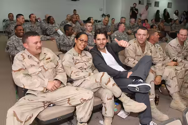 Eric Bana has his picture taken with US Soldiers,Seabee Sailors, Airmen and Marines at Camp Arifjan, Kuwait, during an April 11, 2009 screening of Star Trek.