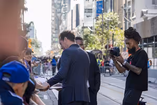 Esteban Bigliardi signs an autograph ahead of the premiere of Glaxo at the Royal Alexandra Theatre during TIFF 2026