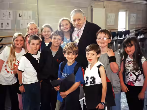 The Janes and Michaels from the original London cast of Mary Poppins in rehearsal with songwriter Robert B. Sherman visiting. Left to right (front): Poppy Lee F