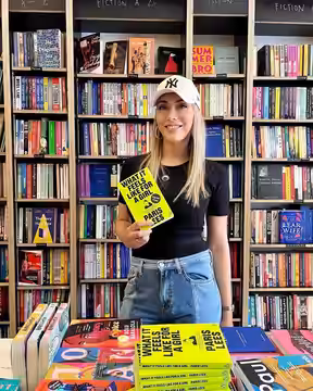 Paris Lees at the Brick Lane Bookshop with her book 'What It Feels Like For A Girl'. (2023)