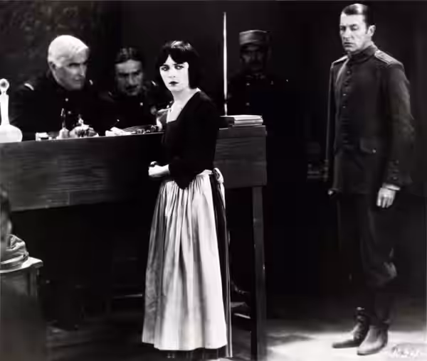 (From left) Charles Lane, unidentified actor, Pola Negri, and Clive Brook in Barbed Wire (1927).