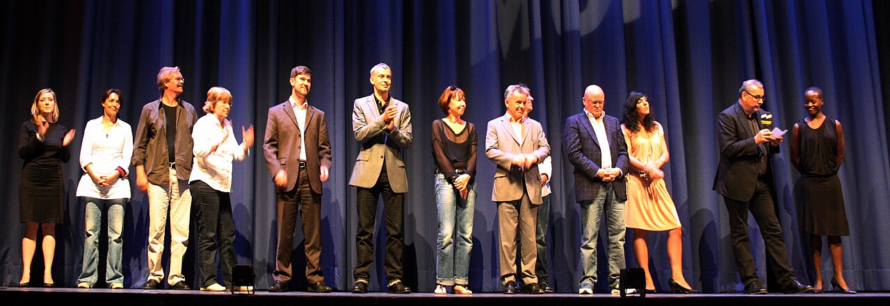 Premiere des Films Kongo auf dem Filmfest München 2010. Personen die an der Produktion beteiligt waren und rechts die Schauspielerin Florence Kasumba.