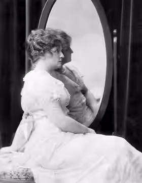 Photograph of Laura Hope Crews in the 1917 Broadway revival of Her Husband's Wife Typed information on reverse of print indicates the production begins January 