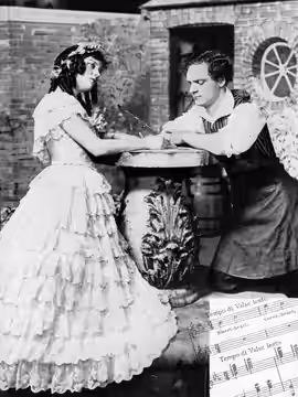 Promotional photograph of Peggy Wood and Charles Purcell in Maytime Caption reads as follows:Scenes from "Maytime." Ottillie Van Zandt and Richard Wayne are a r (1917)