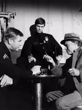 Photo of Martin Milner and Kent McCord from the television program Adam-12. The officers question a former convict who wants to go back to prison. (1974)