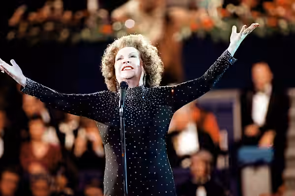 Singer Ethel Merman performs for the honored guests during the gala celebration at the Capital Center, on Inauguration Day. (1981)