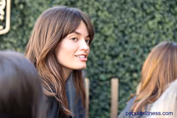 Close-up of beautiful Emma Mackey at TIFF 2022 after press conference for movie Emily