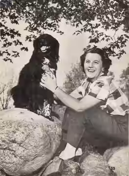 Actress Anne Seymour with her dog (1953)