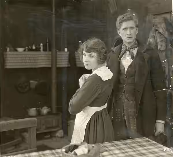 A scene from the American film The Brand (1919), with Kay Laurel and Russell Simpson. Date stamped May 5, 1919. Subjects: motion pictures, actresses, actors